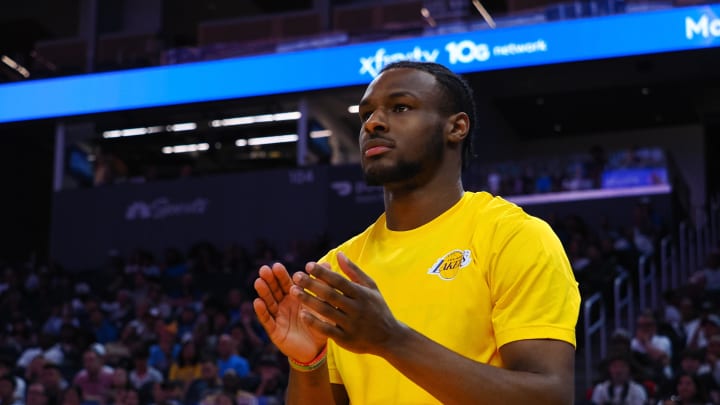 Jul 7, 2024; San Francisco, CA, USA; Los Angeles Lakers guard Bronny James Jr. (9) claps for a teammate during the second quarter against the Golden State Warriors at Chase Center. Mandatory Credit: Kelley L Cox-USA TODAY Sports