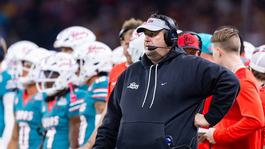 New Mexico Lobos head coach Jason Eck against the Minnesota Golden Gophers during the Rate Bowl.
