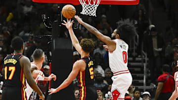 Jan 15, 2025; Chicago, Illinois, USA;  Atlanta Hawks guard Dyson Daniels (5) shoots against ]Chicago Bulls guard Coby White (0) during the first half at the United Center. Mandatory Credit: Matt Marton-Imagn Images