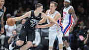 Nov 7, 2025; Brooklyn, New York, USA;  Brooklyn Nets guard Egor Demin (8) looks to drive past Detroit Pistons forward Duncan Robinson (55) in the second quarter at Barclays Center. Mandatory Credit: Wendell Cruz-Imagn Images
