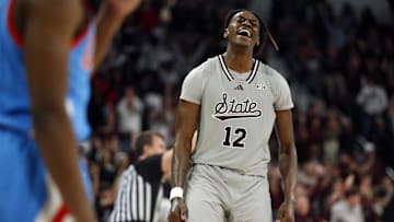 Feb 21, 2024; Starkville, Mississippi, USA; Mississippi State Bulldogs forward KeShawn Murphy (12) reacts after a three point basket during the second half against the Mississippi Rebels at Humphrey Coliseum. Mandatory Credit: Petre Thomas-Imagn Images