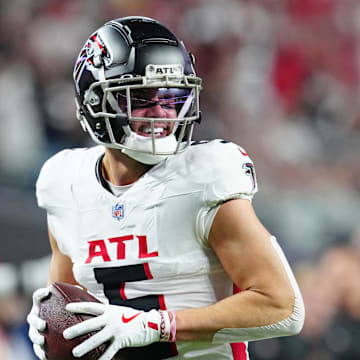 Dec 16, 2024; Paradise, Nevada, USA; Atlanta Falcons wide receiver Drake London (5) celebrates after scoring a touchdown against the Las Vegas Raiders during the first quarter at Allegiant Stadium. Mandatory Credit: Stephen R. Sylvanie-Imagn Images
