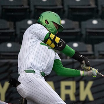 Oregon outfielder Mason Neville makes contact as the Oregon Ducks host the Minnesota Golden Gophers Saturday, March 15, 2025, at PK Park in Eugene, Ore.