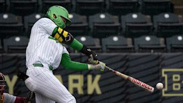 Oregon outfielder Mason Neville bashed a pair of home runs Sunday, leadoff shots in the first and the ninth. That gives him 15 for the year, tops in the Big Ten.