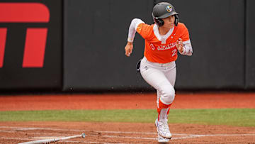 Talons second baseman Sydney Romero hits a double as a Team Kilfoyl member during an Athletes Unlimited Pro (now known as the All-Star Cup) game at Max R. Joyner Family Stadium on Aug. 7, 2024 in Greenville, N.C.