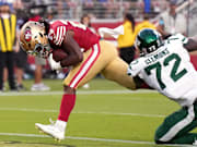 Mason scores a touchdown against New York Jets defensive end Micheal Clemons during the third quarter at Levi's Stadium.