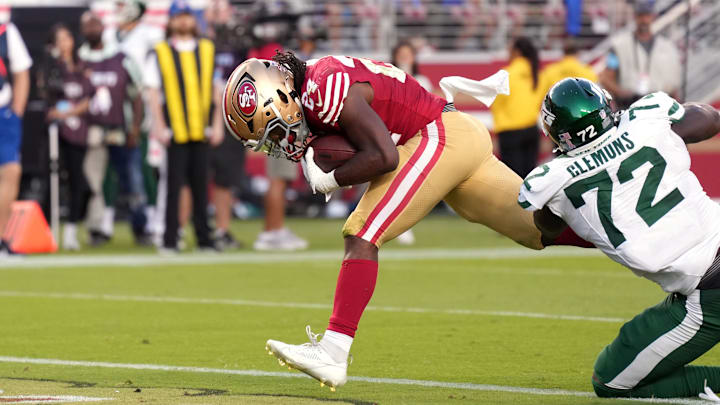 Mason scores a touchdown against New York Jets defensive end Micheal Clemons during the third quarter at Levi's Stadium.