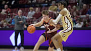 Jan 29, 2025; Virginia Tech guard Jaden Schutt (2) maneuvers around Florida State guard Justin Thomas (25).