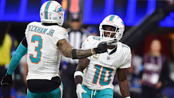 Nov 11, 2024; Inglewood, California, USA; Miami Dolphins wide receiver Tyreek Hill (10) celebrates his touchdown scored against the Los Angeles Rams with wide receiver Odell Beckham Jr. (3) during the second half at SoFi Stadium. Mandatory Credit: Gary A. Vasquez-Imagn Images