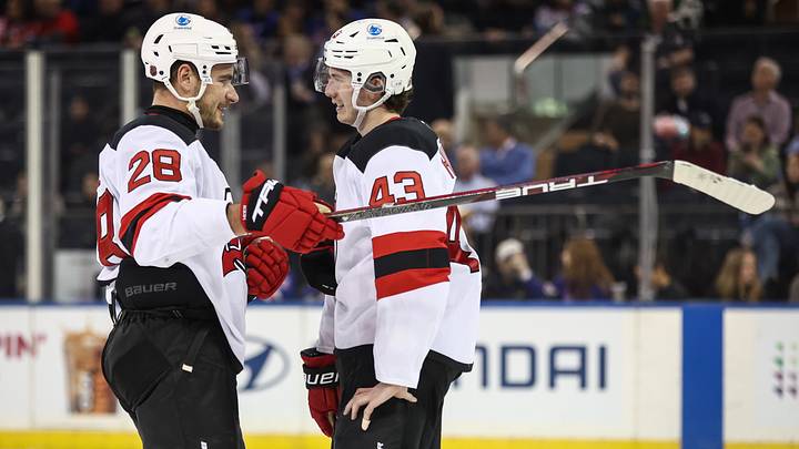 New Jersey Devils right wing Timo Meier (28) and defenseman Luke Hughes (43) talk during a timeout in the third period against the New York Rangers at Madison Square Garden. Mandatory Credit: Wendell Cruz-Imagn Images