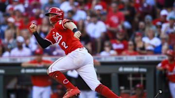 Jul 10, 2025; Cincinnati, Ohio, USA; Cincinnati Reds designated hitter Austin Hays (12) runs to second after hitting a two-run double in the sixth inning against the Miami Marlins at Great American Ball Park. Mandatory Credit: Katie Stratman-Imagn Images