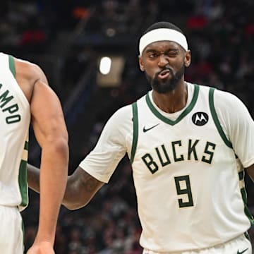 Nov 13, 2023; Milwaukee, Wisconsin, USA; Milwaukee Bucks forward Bobby Portis (9) reacts with forward Giannis Antetokounmpo (34) after scoring a basket in the fourth quarter against the Chicago Bulls at Fiserv Forum. Mandatory Credit: Benny Sieu-Imagn Images