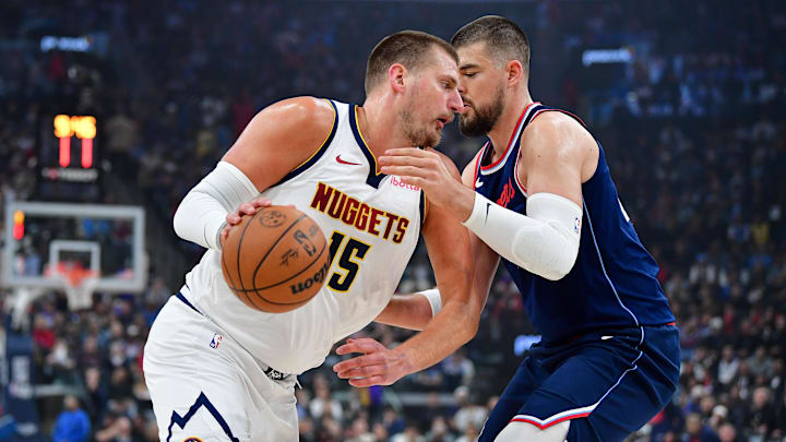 Apr 24, 2025; Inglewood, California, USA; Denver Nuggets center Nikola Jokic (15) moves to the basket against Los Angeles Clippers center Ivica Zubac (40) during the first half of game three in the first round for the 2024 NBA Playoffs at Intuit Dome. Mandatory Credit: Gary A. Vasquez-Imagn Images Apr 24, 2025; Inglewood, California, USA; Denver Nuggets center Nikola Jokic (15) moves to the basket against Los Angeles Clippers center Ivica Zubac (40) during the first half of game three in the first round for the 2024 NBA Playoffs at Intuit Dome. Mandatory Credit: Gary A. Vasquez-Imagn Images