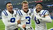 Indianapolis Colts punter Rigoberto Sanchez (8), Indianapolis Colts place kicker Spencer Shrader (3) and Indianapolis Colts safety Cam Bynum (0) celebrate as the leave the field Sunday, Sept. 14, 2025, after a game against the Denver Broncos at Lucas Oil Stadium in Indianapolis. A field goal by Indianapolis Colts place kicker Spencer Shrader (3) won the game for the Indianapolis Colts.