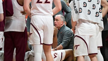 Mar 1, 2025; Virginia Tech head coach Mike Young talks to his team during a timeout.
