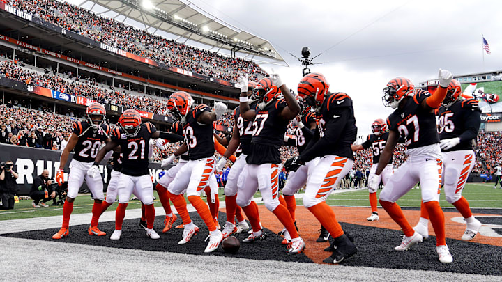 The Cincinnati Bengals defense celebrates with Cincinnati Bengals cornerback Mike Hilton (21) after his interception in the third quarter during an NFL football game between the Seattle Seahawks and the Cincinnati Bengals Sunday, Oct. 15, 2023, at Paycor Stadium in Cincinnati.