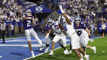 Sep 21, 2024; Provo, Utah, USA; Kansas State Wildcats quarterback Avery Johnson (2) passes the ball against the Brigham Young Cougars during the first quarter at LaVell Edwards Stadium. Mandatory Credit: Rob Gray-Imagn Images