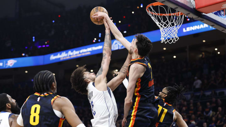 May 15, 2024; Oklahoma City, Oklahoma, USA; Oklahoma City Thunder forward Chet Holmgren (7) blocks a shot by Dallas Mavericks center Dereck Lively II (2) during the second half of game five of the second round for the 2024 NBA playoffs at Paycom Center. Mandatory Credit: Alonzo Adams-USA TODAY Sports