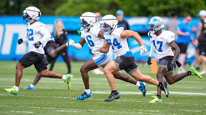 From left, Detroit Lions safety Brian Branch (32), cornerback Terrion Arnold (6), safety Loren Strickland (24), and cornerback Dicaprio Bootle (17) during training camp at Meijer Performance Center in Allen Park on Sunday, July 20, 2025.