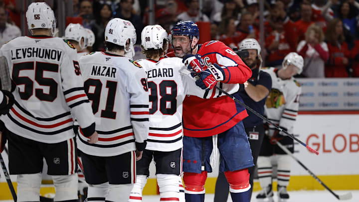 Apr 4, 2025; Washington, District of Columbia, USA; Washington Capitals left wing Alex Ovechkin (8) greets Chicago Blackhawks center Connor Bedard (98) after the game at Capital One Arena. Ovechkin scored the 893rd and 894th goals of his career, tying Wayne Gretzky for most all-time goals scored in the NHL. Mandatory Credit: Geoff Burke-Imagn Images