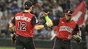 Chicago White Sox shortstop Colson Montgomery (12) and second baseman Lenyn Sosa (50) celebrate after defeating the Chicago Cubs at Rate Field. 