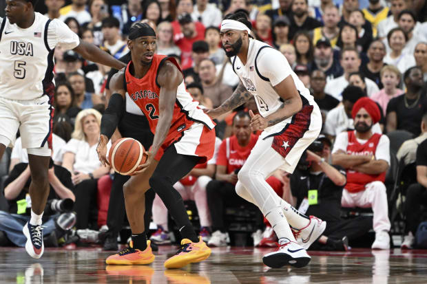 Team USA center Anthony Davis plays defense in the Olympics.