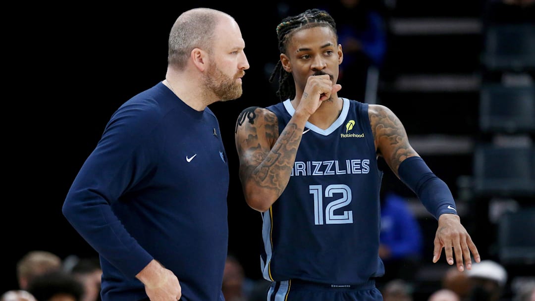 Mar 5, 2025; Memphis, Tennessee, USA; Memphis Grizzlies head coach Taylor Jenkins talks with guard Ja Morant (12) during the fourth quarter against the Oklahoma City Thunder at FedExForum. Mandatory Credit: Petre Thomas-Imagn Images