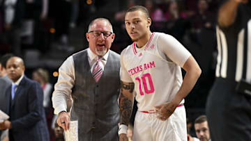 Jan 28, 2025; College Station, Texas, USA; Texas A&M Aggies head coach Buzz Williams speaks with guard CJ Wilcher (10) during the first half time-out against the Oklahoma Sooners at Reed Arena. The Aggies defeated the Sooners 75-68. Mandatory Credit: Maria Lysaker-Imagn Images 