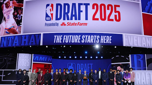     The 2025 NBA Draft class and the NBA commissioner Adam Silver are on stage before the first round of the NBA 2025 draft