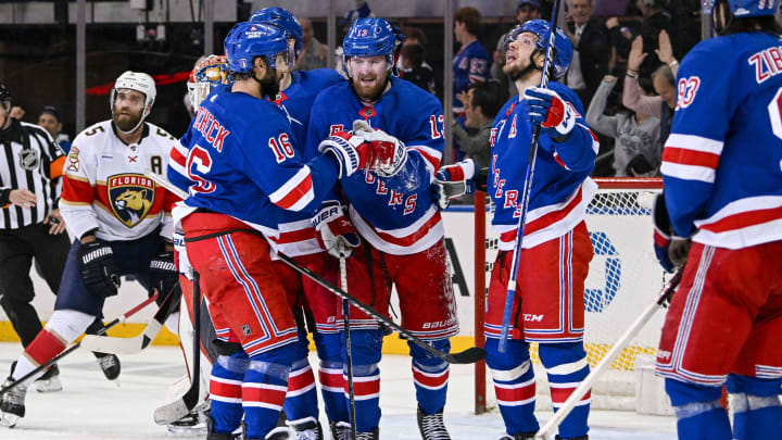 May 30, 2024; New York, New York, USA; The New York Rangers celebrate a goal by left wing Alexis Lafreniere (13) against the Florida Panthers during the third period in game five of the Eastern Conference Final of the 2024 Stanley Cup Playoffs at Madison Square Garden. Mandatory Credit: Dennis Schneidler-USA TODAY Sports