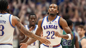 Nov 3, 2025; Lawrence, Kansas, USA; Kansas Jayhawks guard Darryn Peterson (22) reacts after scoring during the first half against the Green Bay Phoenix at Allen Fieldhouse. Mandatory Credit: Jay Biggerstaff-Imagn Images