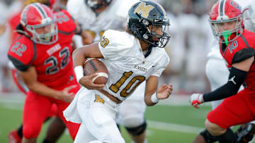 Midwest City's Deangelo Irvin carries the ball during a high school football game between Carl Albert and Midwest City at Carl Albert, Midwest City Vs Carl Albert Football