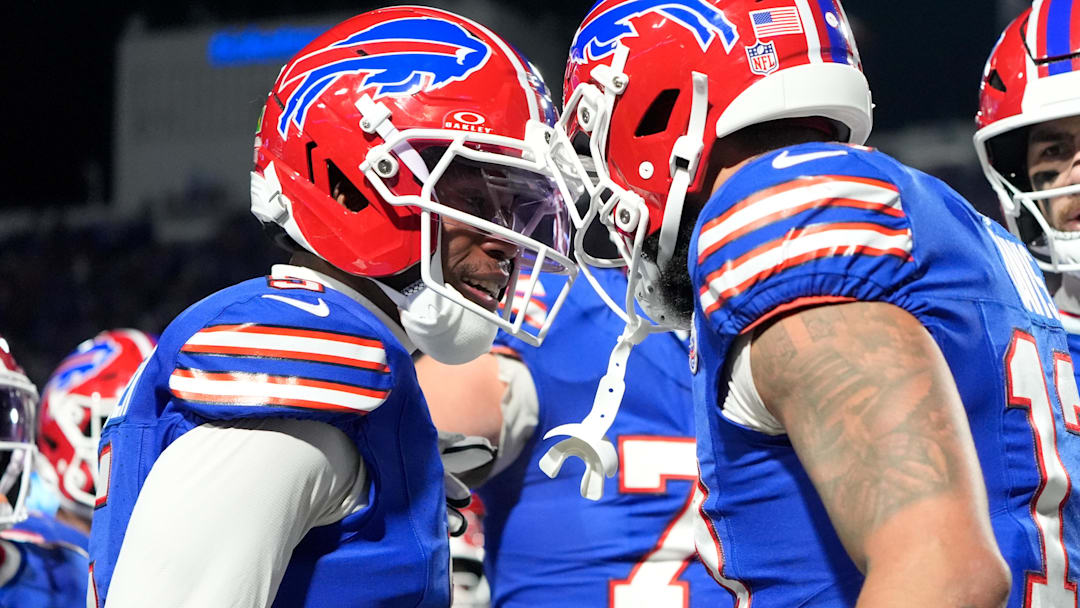 Buffalo Bills WR Gabe Davis celebrates with WR Joshua Palmer after scoring a touchdown against the New York Jets.