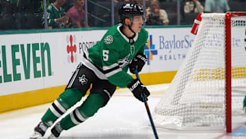 Nils Lundkvist #5 of Dallas Stars skates up ice while...