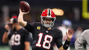 Dec 22, 2024; Atlanta, Georgia, USA; Atlanta Falcons quarterback Kirk Cousins (18) prepares for a game against the New York Giants at Mercedes-Benz Stadium. Mandatory Credit: Brett Davis-Imagn Images
