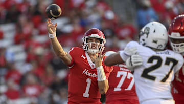 Sep 12, 2025; Houston, Texas, USA; Houston Cougars quarterback Conner Weigman (1) attempts a pass during the first quarter against the Colorado Buffaloes at TDECU Stadium. Mandatory Credit: Troy Taormina-Imagn Images
