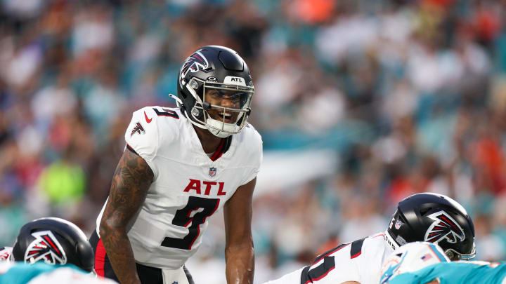 Aug 9, 2024; Miami Gardens, Florida, USA; Atlanta Falcons quarterback Michael Penix Jr. (9) calls a play at the line against the Miami Dolphins in the first quarter during preseason at Hard Rock Stadium. Mandatory Credit: Nathan Ray Seebeck-USA TODAY Sports