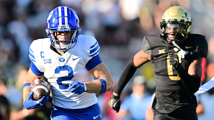 BYU's Chase Roberts flies up the field against UCF.