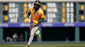 Lawrence Butler trots the bases after a home run