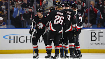 Apr 17, 2025; Buffalo, New York, USA;  Buffalo Sabres right wing JJ Peterka (77) celebrates his goal with teammates during the third period against the Philadelphia Flyers at KeyBank Center. Mandatory Credit: Timothy T. Ludwig-Imagn Images