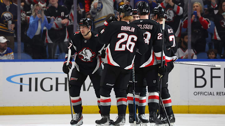 Apr 17, 2025; Buffalo, New York, USA;  Buffalo Sabres right wing JJ Peterka (77) celebrates his goal with teammates during the third period against the Philadelphia Flyers at KeyBank Center. Mandatory Credit: Timothy T. Ludwig-Imagn Images