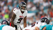 Aug 9, 2024; Miami Gardens, Florida, USA; Atlanta Falcons quarterback Michael Penix Jr. (9) calls a play at the line against the Miami Dolphins in the first quarter during preseason at Hard Rock Stadium. Mandatory Credit: Nathan Ray Seebeck-USA TODAY Sports