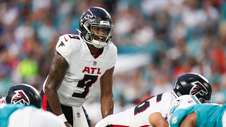 Aug 9, 2024; Miami Gardens, Florida, USA; Atlanta Falcons quarterback Michael Penix Jr. (9) calls a play at the line against the Miami Dolphins in the first quarter during preseason at Hard Rock Stadium. Mandatory Credit: Nathan Ray Seebeck-USA TODAY Sports