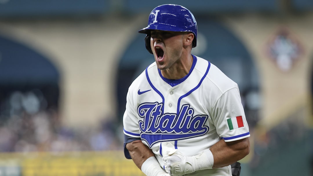 Mar 8, 2026; Houston, TX, United States;  Italy left fielder Dante Nori (16) reacts after hitting a RBI single against the Great Britain in the fourth inning at Daikin Park. Mandatory Credit: Thomas Shea-Imagn Images