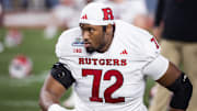 Dec 26, 2024; Phoenix, AZ, USA; Rutgers Scarlet Knights offensive lineman Hollin Pierce (72) against the Kansas State Wildcats during the Rate Bowl at Chase Field. Mandatory Credit: Mark J. Rebilas-Imagn Images