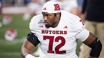 Dec 26, 2024; Phoenix, AZ, USA; Rutgers Scarlet Knights offensive lineman Hollin Pierce (72) against the Kansas State Wildcats during the Rate Bowl at Chase Field. Mandatory Credit: Mark J. Rebilas-Imagn Images