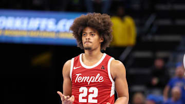 Feb 9, 2025; Memphis, Tennessee, USA; Temple Owls forward Elijah Gray (22) reacts after a three point basket against the Memphis Tigers during the second half at FedExForum. Mandatory Credit: Wesley Hale-Imagn Images