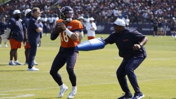 Jul 27, 2024; Lake Forest, IL, USA; Chicago Bears quarterback Caleb Williams (18) throws  a pass during Chicago Bears Training Camp at Halas Hall. Mandatory Credit: David Banks-USA TODAY Sports