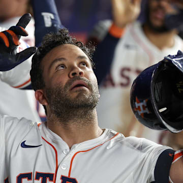 Houston Astros second baseman Jose Altuve (27) reacts to his two run home run against the Texas Rangers in the third inning at Daikin Park. 