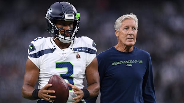 Seattle Seahawks quarterback Russell Wilson and manager Pete Carroll
